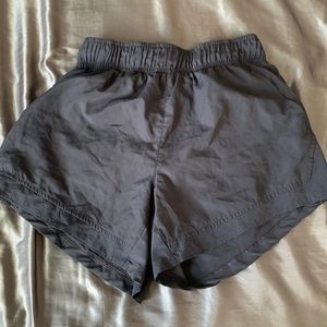 Dark gray workout shorts.